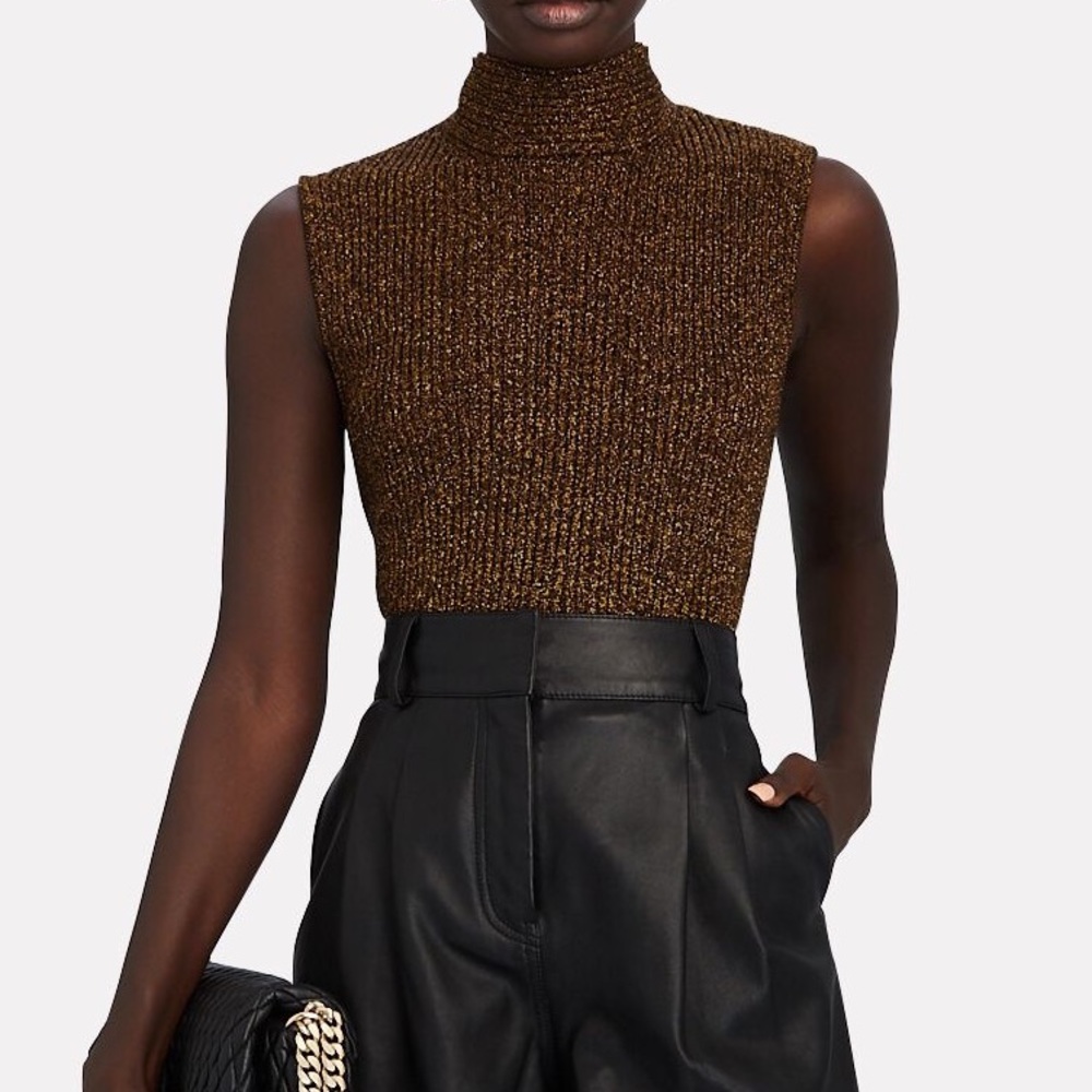 Never worn GANNI
Metallic Rib Knit Tie-Back Top